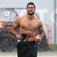 Illustration for article titled Tim Tebow Didnt Really Think Y’all Would Be Filming His Shirtless Run Through The Rain